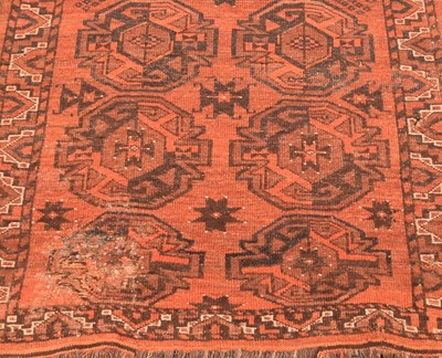 Lot 833 - Two Afgham Bokara pattern rugs and another similar