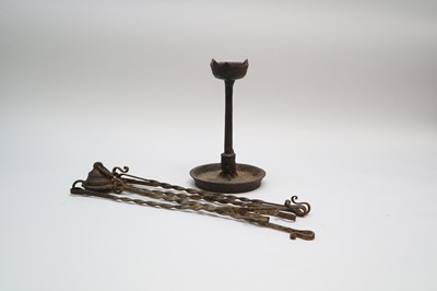 Lot 548 - An early cast iron whale oil lamp