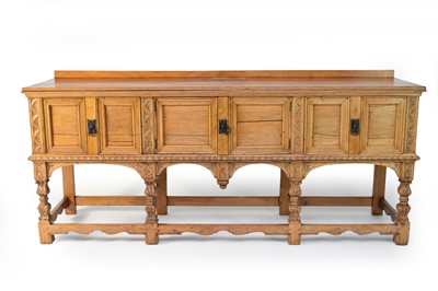 Lot 654 - A 20th century, Renaissance style, pale oak dresser base