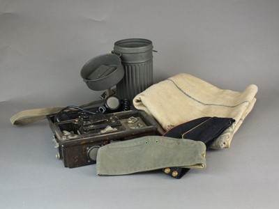 Lot 165 - Militaria including German field telephone, grain sack and gas mask canister.