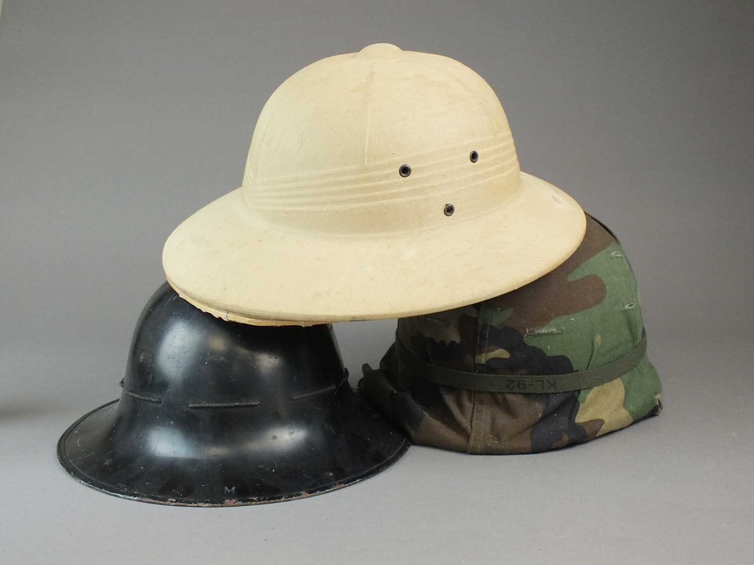 Lot 31 - Civil Defence helmet, post-war helmet and pith helmet