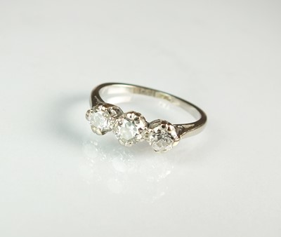 Lot 101 - A three stone diamond ring