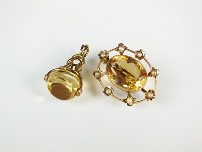 Lot 272 - A citrine and split pearl brooch and a swivel fob