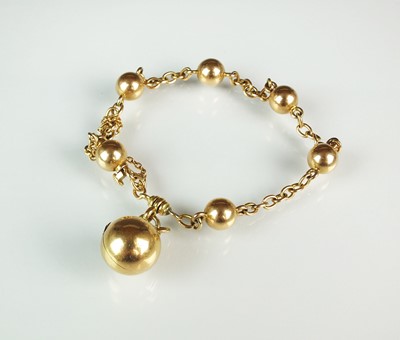 Lot 135 - A yellow metal oval and orb link bracelet