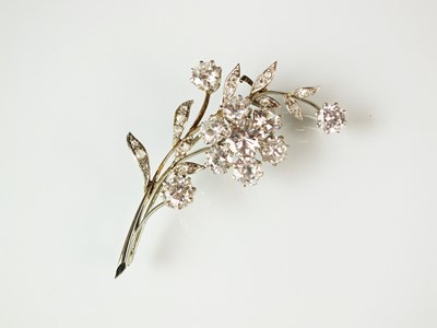 Lot 252 - A rose cut diamond and cubic zirconia floral spray brooch