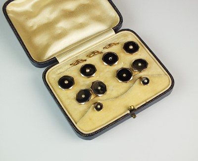 Lot 277 - A cased set of split seed pearl set dress studs and cufflinks