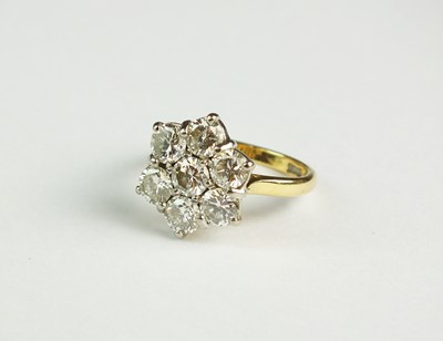 Lot 146 - A seven stone diamond floral cluster ring