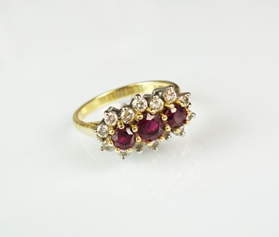 Lot 113 - An 18ct gold ruby and diamond ring