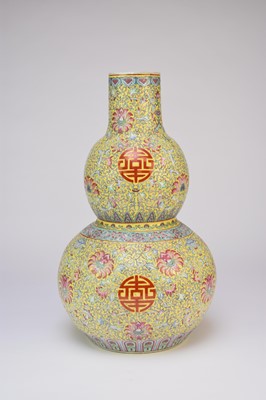 Lot 40 - A large Chinese yellow ground famille rose vase, 20th century