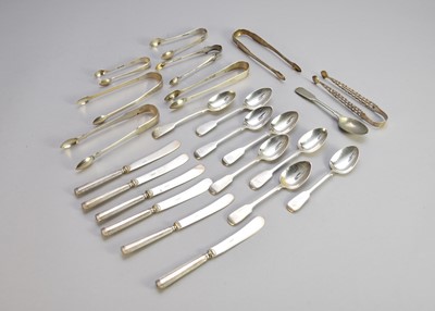 Lot 209 - A collection of silver spoons and sugar tongs