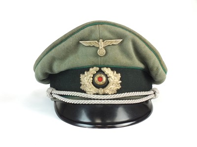 Lot 141 - German Third Reich Jaeger (Light Infantry) Officer's cap, battle-worn