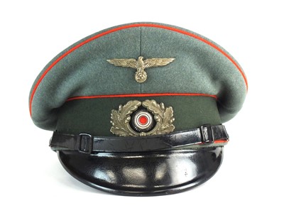 Lot 140 - A German Third Reich Artillery pre-war NCO visor cap