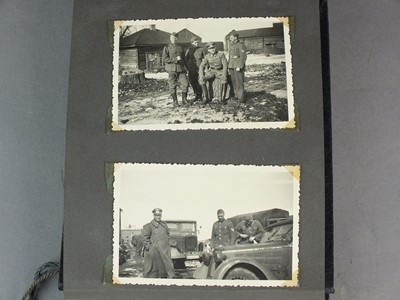 Lot 167 - A group of German bestowal certificates to Dr Hubert Wirtz, with personal photograph album
