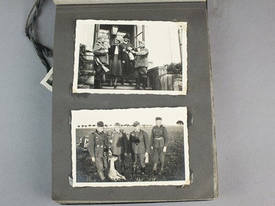 Lot 167 - A group of German bestowal certificates to Dr Hubert Wirtz, with personal photograph album