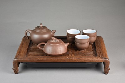 Lot 87 - A Chinese Yixing tea set and accessories, 20th century