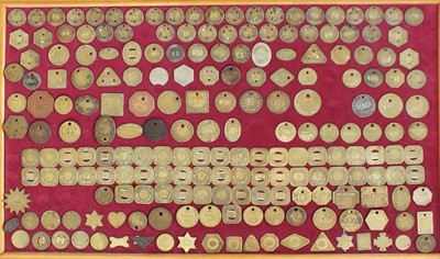 226 - A collection of brass and white metal colliery and associated tokens and checks