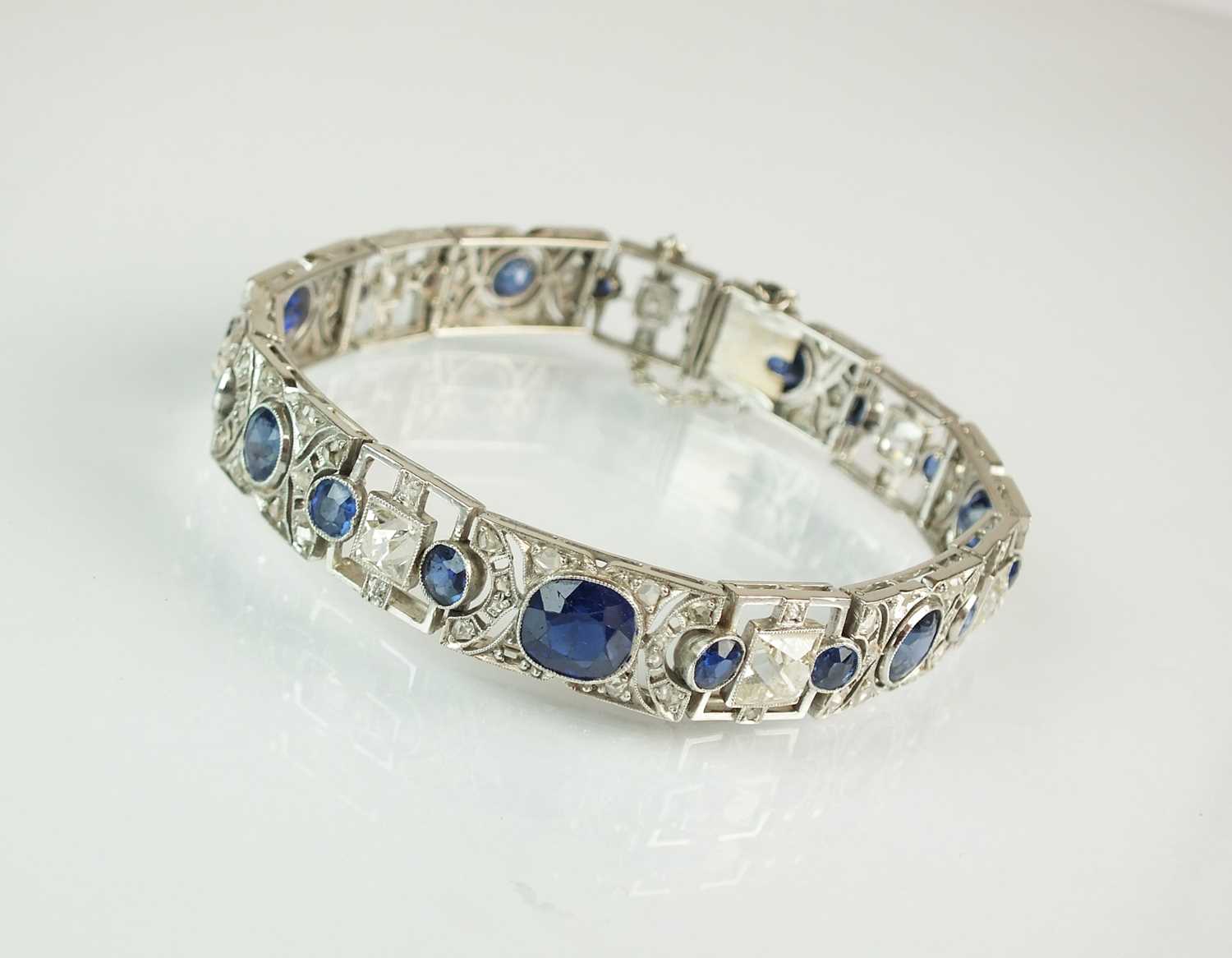 Lot 63 - An Art Deco diamond and sapphire bracelet
