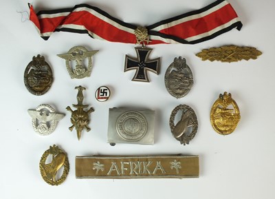 Lot 159 - Thirteen reproduction post-war badges, medals and a belt buckle