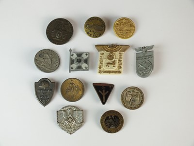 Lot 177 - Thirteen German badges and tinnies