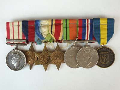 Lot 11 - A group of seven WWII medals awarded to J.K Collier, Royal Navy