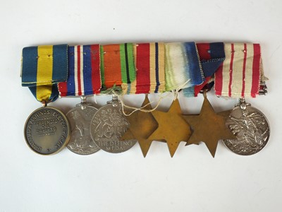 Lot 11 - A group of seven WWII medals awarded to J.K Collier, Royal Navy