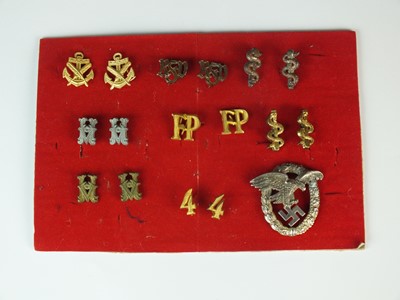 Lot 183 - A group of German shoulder board cyphers and Luftwaffe Observer's badge