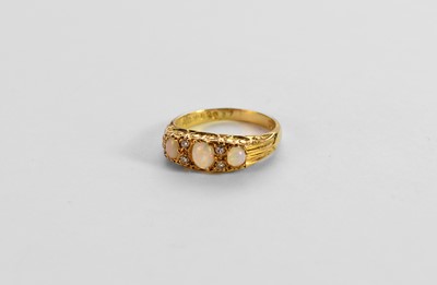 Lot 282 - An 18ct gold opal and diamond ring