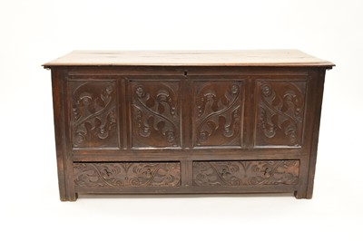 Lot 801 - An 18th century oak four-panel mule chest