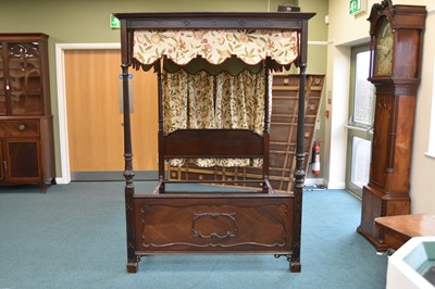 Lot 297 - A 20th century French mahogany four-poster bed