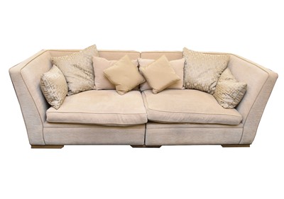 Lot 775 - A modern three-seater sofa