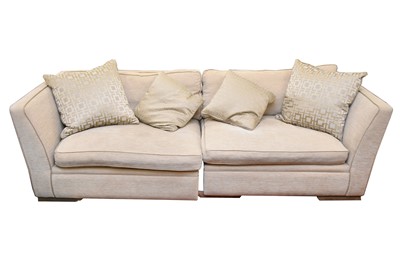 Lot 778 - A modern three-seater sofa and stool en suite