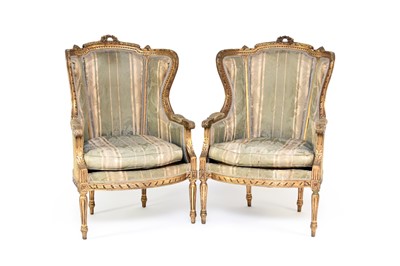 Lot 293 - A pair of late 19th century French, Louis XVI style, gilded fauteuils (armchairs)