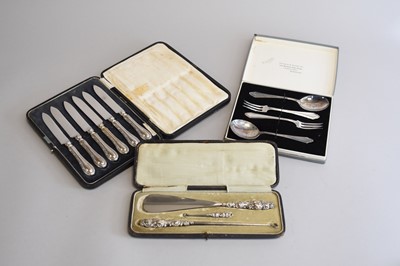 Lot 49 - A cased set of six silver handled knives