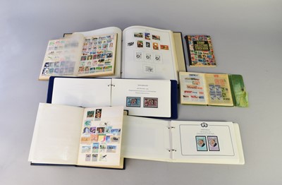 Lot 384 - A collection of thirty-one albums/stockbooks of mint and used stamps