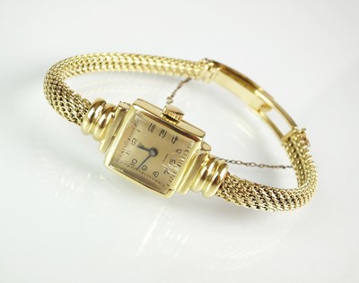 Lot 104 - A Lady’s 14ct gold Este bracelet wristwatch