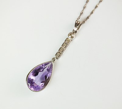 Lot 328 - A 9ct white gold amethyst and diamond pendant