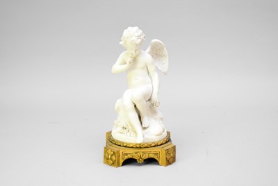 Lot 701 - A French bisque porcelain and ormolu figure of Cupid