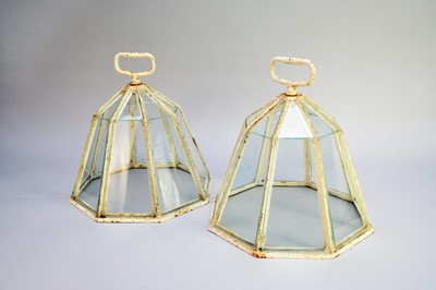 Lot 700 - A pair of octagonal cast iron cloches