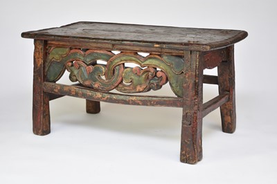 Lot 157 - An 17th/18th century Tibetan polychrome, chogtse or 'lama' occasional table