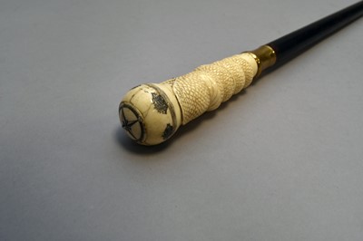 Lot 489 - A carved bone-handled ebonised cane of nautical interest