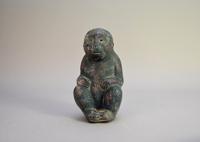 Lot 595 - A Chinese Han style stoneware figure of a monkey