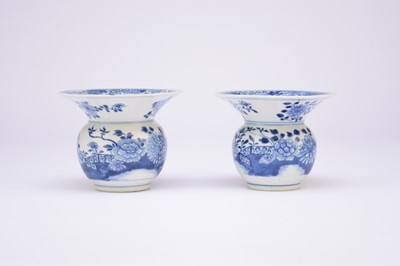 Lot 41 - A pair of Chinese blue and white spittoons, 18th century