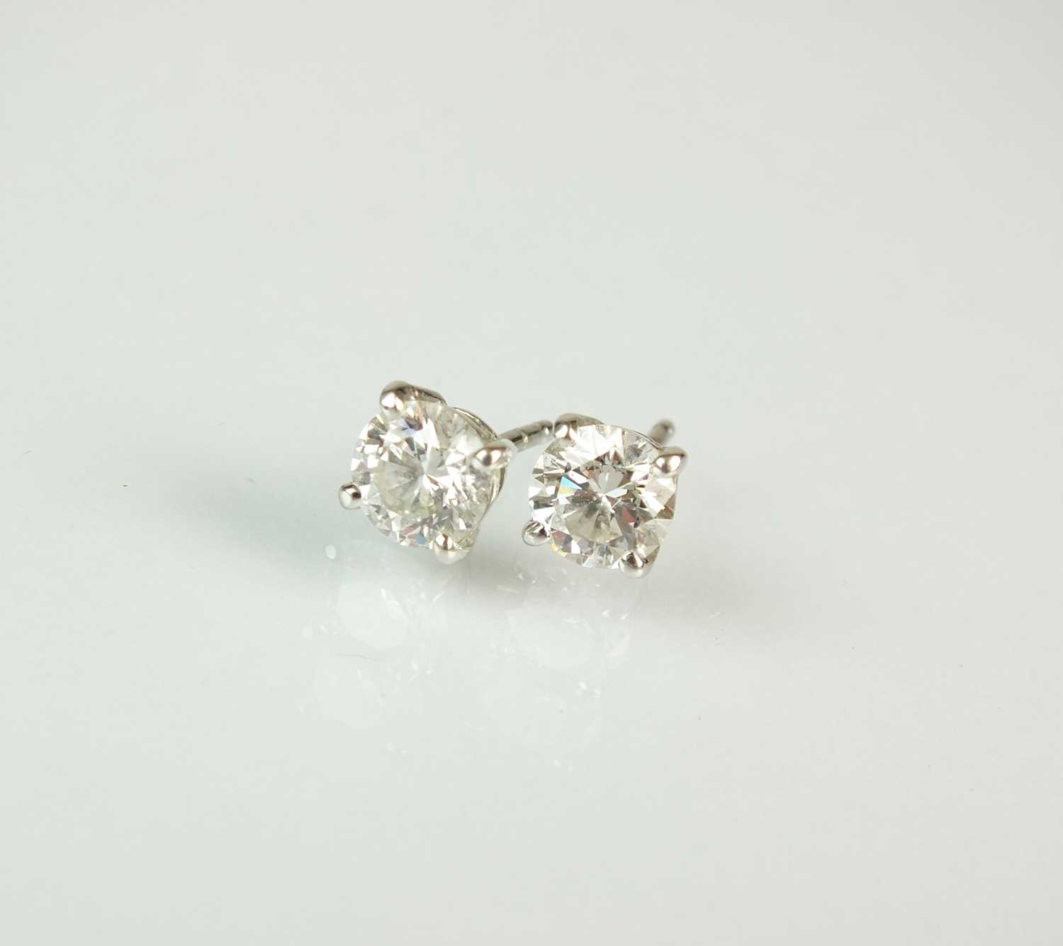 Lot 39 - A pair of diamond stud earrings