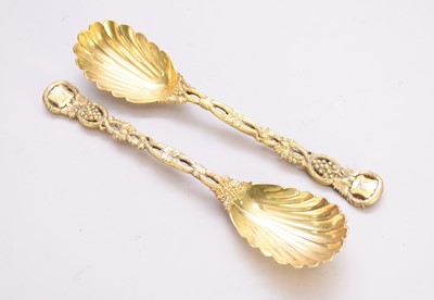 Lot 4 - A pair of Victorian silver gilt 'Pierced Vine' pattern serving spoons by Hunt & Roskell