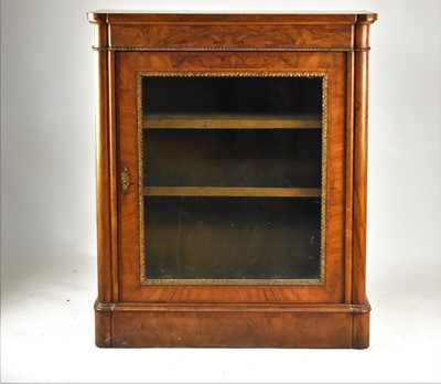 Lot 592 - A 19th century walnut pier cabinet