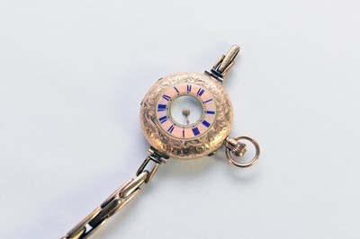 Lot 339 - A continental yellow metal and enamel half hunter fob watch