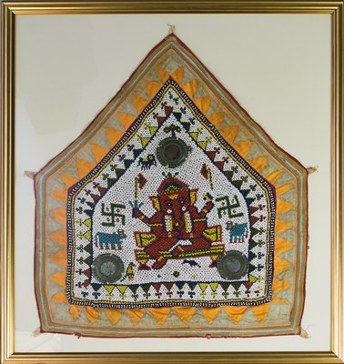 Lot 663 - An Indian framed Gujarat beadwork panel and a large carved Burmese teak dancing figure