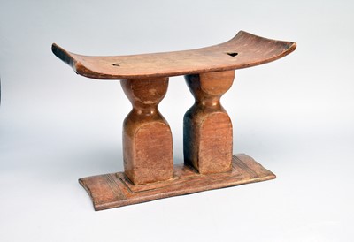 Lot 678 - An Ashanti wooden tribal stool, Ghana, West Africa