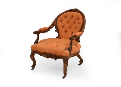 Lot 807 - A Victorian walnut upholstered open armchair