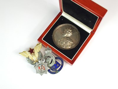 Lot 361 - A silver medallion and a collection of badges